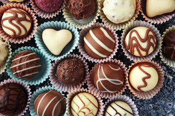a lot of variety chocolate pralines, belgian confectionery gourmet chocolate.
