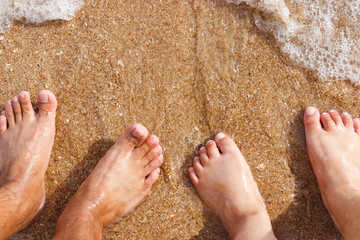 Beach couple in love on sand background. summer, happy weekend concept.