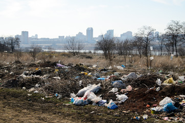 Dump. Environmental pollution. The mountains of garbage in the city. Landfills.