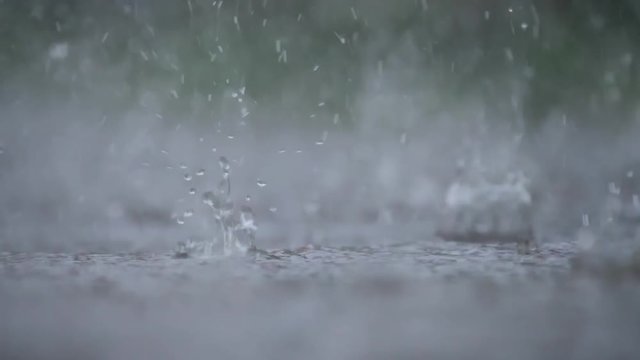 heavy rain drops hitting ground 02