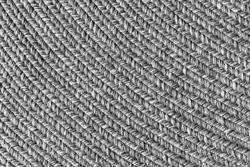 Jute braided home spiral rug background texture pattern - close-up