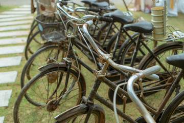 Old bicycles parking a lot.