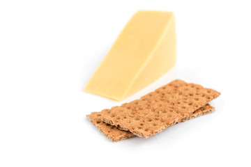 Cheese and crispbread isolated on white background