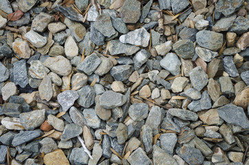 Texture of small gray stones close-up macro. Small rocks background texture, abstract stone texture pebbles.