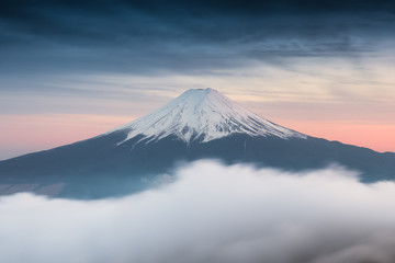 Top of Mt.Fuji with beautiful cloud in winter sunset