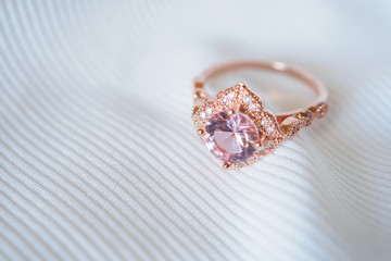 Jewelry luxury pink gold sapphire gemstone ring background