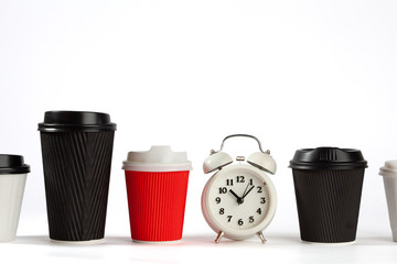 Time for coffee concept with retro alarm clock and coffee cups on white background with copy space