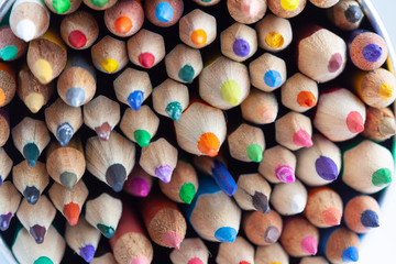 Bunch of sharpened colored pencils closeup
