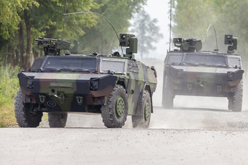 German light armoured  reconnaissance vehicle drives on a road
