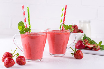 Delicious strawberry smoothie. Morning drinks with fresh berries, yogurt or milk