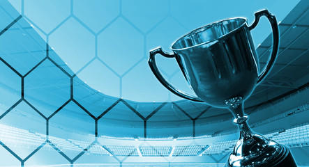 Blue theme trophy with background fade hexagon pattern on stadium.