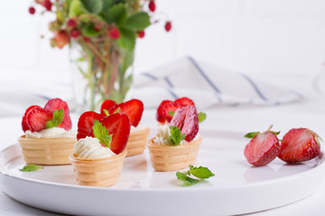 Fresh and tasty  snack  with cream cheese  fruits and berries. Strawberries time