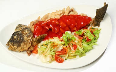 Chinese carp (carp fillet fried in boiling oil with sweet and sour sauce)