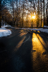 Asphalt road and curve in the italian countryside.