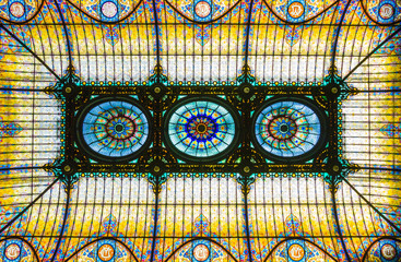 Colorful stained glass ceiling in floral art nouveau style
