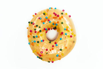 Fototapeta na wymiar Appetizing donut with sprinkles isolated on white background.