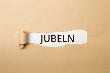 JUBELN Schriftzug - aufgerissenes Papier