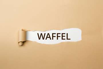WAFFEL Schriftzug - aufgerissenes Papier