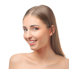 Obraz premium Happy young woman with a beautiful smile