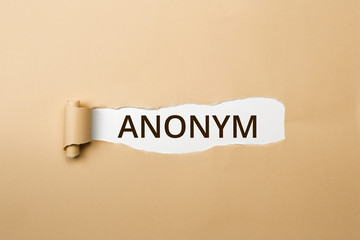 ANONYM Schriftzug - aufgerissenes Papier