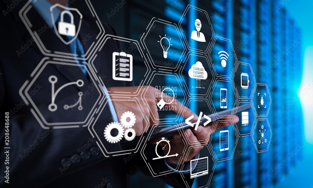 Poster businessman hand using tablet computer and server room