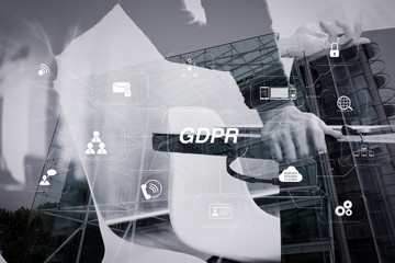 Man using VOIP headset with digital tablet computer docking smart keyboard, concept communication, it support, call center and customer service help desk