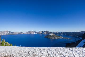 Beautiful scenery of Crater Lake and Wizard Island in summer as seen from the north rim, Oregon, USA