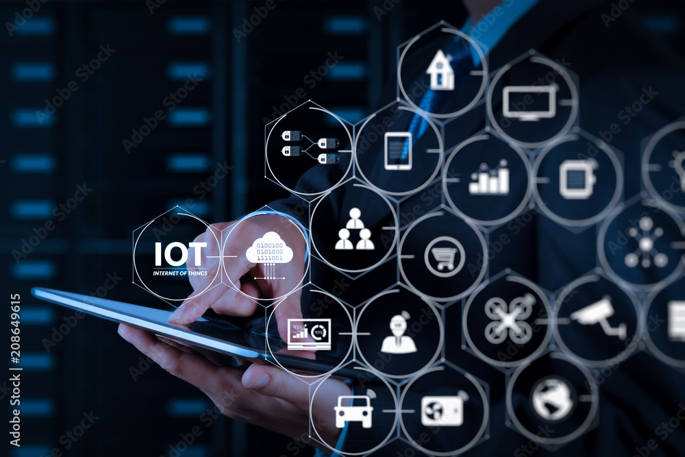 Poster businessman hand using tablet computer and server room