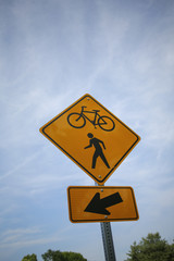 Yellow Bicycle and Pedestrian Crossing Street Sign Isolated