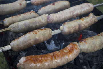 grilled sausage on a barbecue grill, thai food