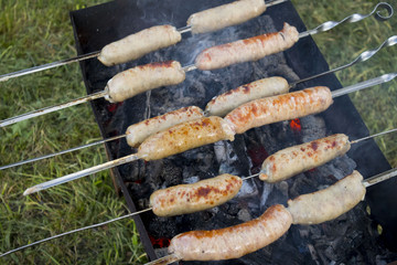 grilled sausage on a barbecue grill, thai food
