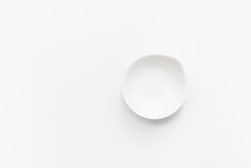 White gravy boat on white background.  Copy space text