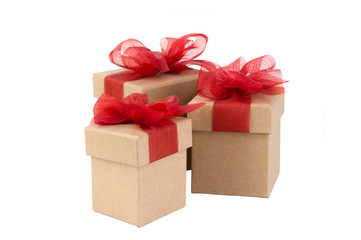 Gift boxes with red bows isolated on white