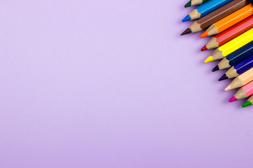 Pencils Set on color paper. Empty space for text and design. Minimalism concept