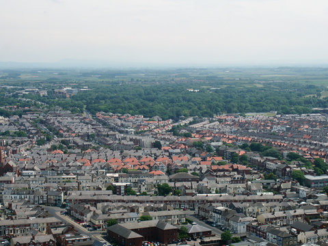 aerial panoramic view of the town of blackpool looking east showing the streets and roads of the town with lancashire countryside stretching to the horizon