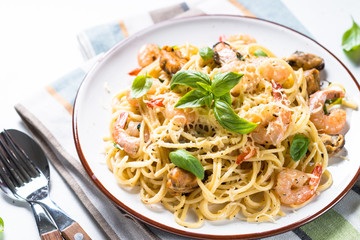 Pasta spaghetti with seafood and cream sauce.