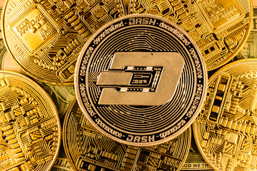 Cryptocurrency Dashcoinand  and gold coins. Blockchain technology
