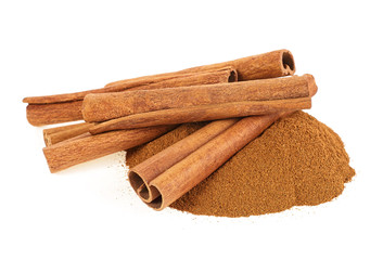 Cinnamon sticks and powder on white background