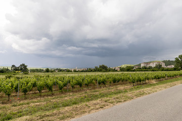 Fototapeta na wymiar stormy weather over the panorama of a village of france