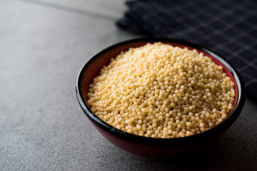 Raw Dry Organic Couscous in a Bowl