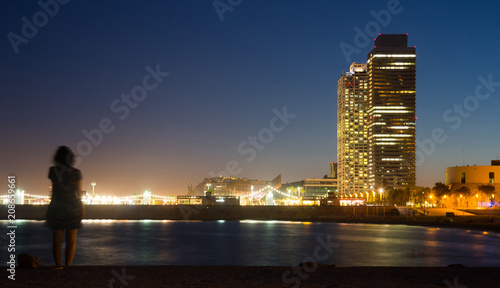 Barceloneta Beach With Skyscrapers In Night Stock Photo And