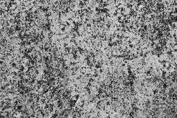 Abstract texture of gray with black spots of various sizes_