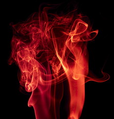 Red smoke on black background