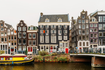 Architecture Of Dutch Houses Facade and Houseboats On Amsterdam Canal