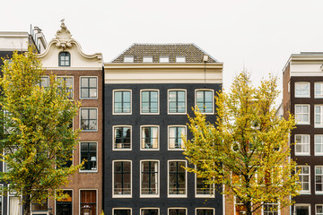 Dutch Houses Facade In Downtown Amsterdam City