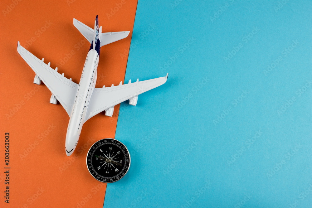 Poster travel concept with plane on color paper background with copy space for text and design.