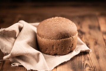 freshly baked bread on dark gray kitchen table Rustic style