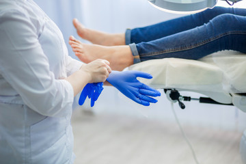 podiatrist wears gloves