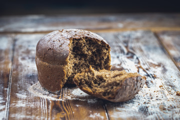 freshly baked bread on dark gray kitchen table Rustic style