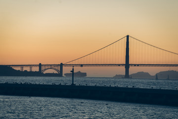 red sunset on the golden gate bridge